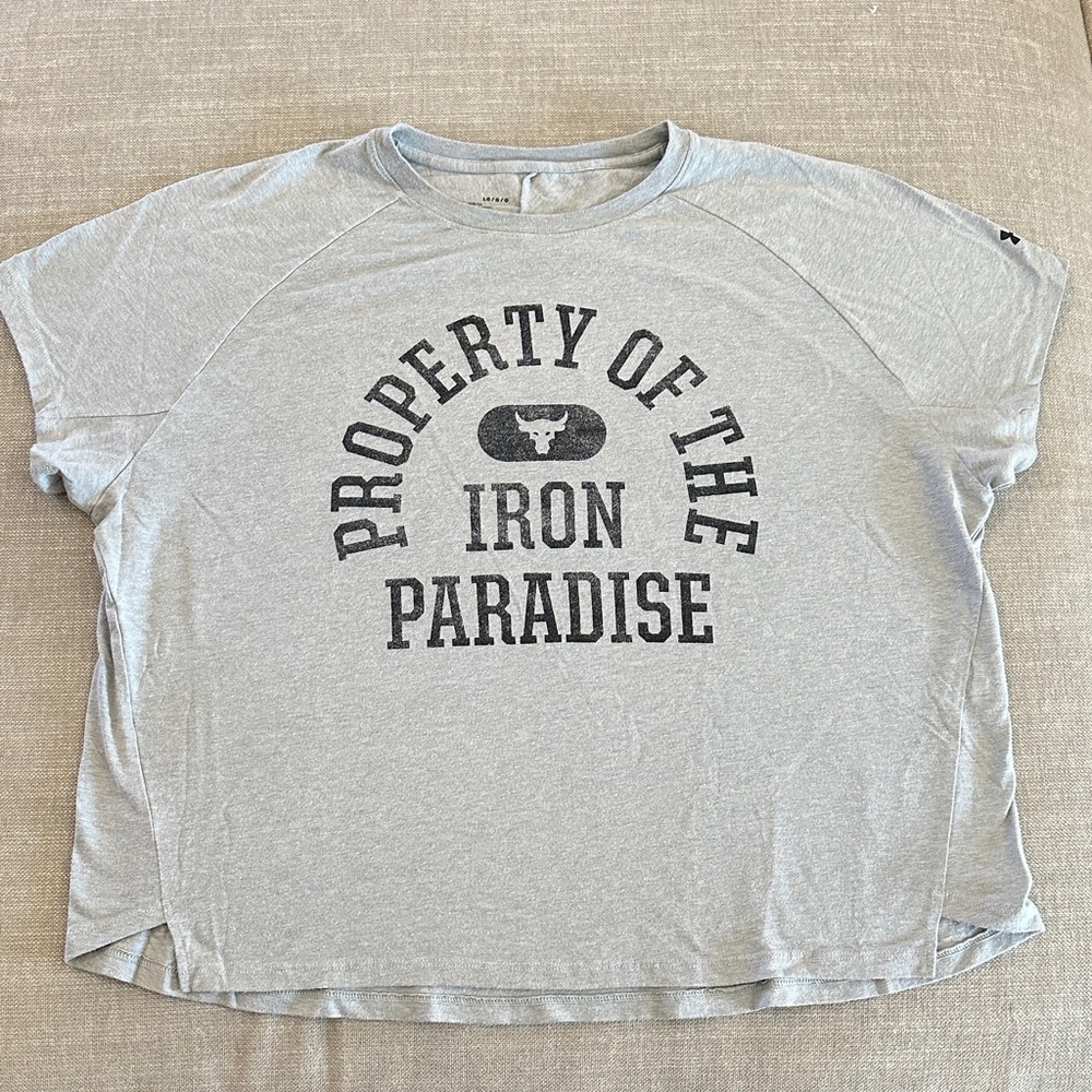 Under Armour women’s L Project Rock Property of the Iron Paradise Tee